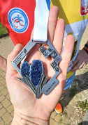 Medal prezentowany na dłoni