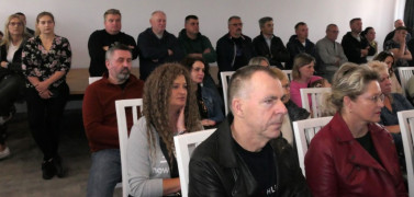 Grupa osób. Uczestnicy spotkania informacyjnego