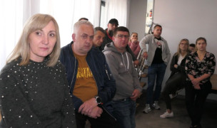 Grupa osób. Uczestnicy spotkania informacyjnego