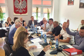 Grupa osób podczas posiedzenia 