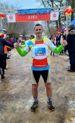 Mężczyzna - Piotr Płoskoński w stroju sportowym 